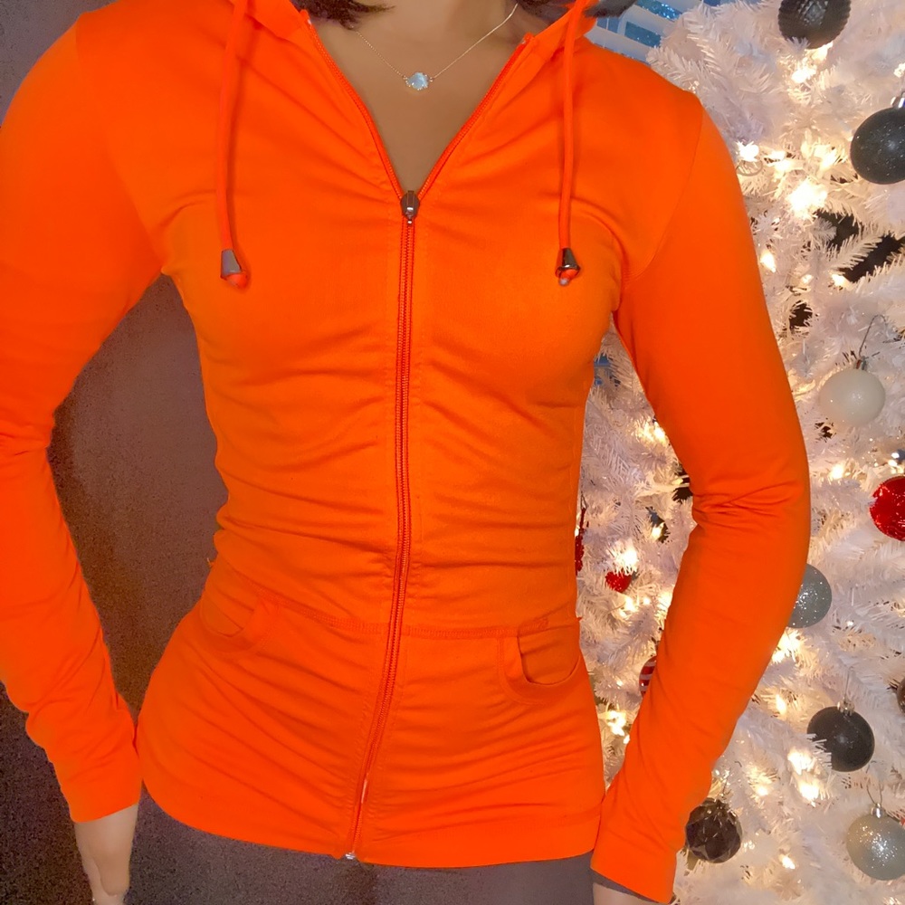 Bright orange work out long sleeve zip up.
